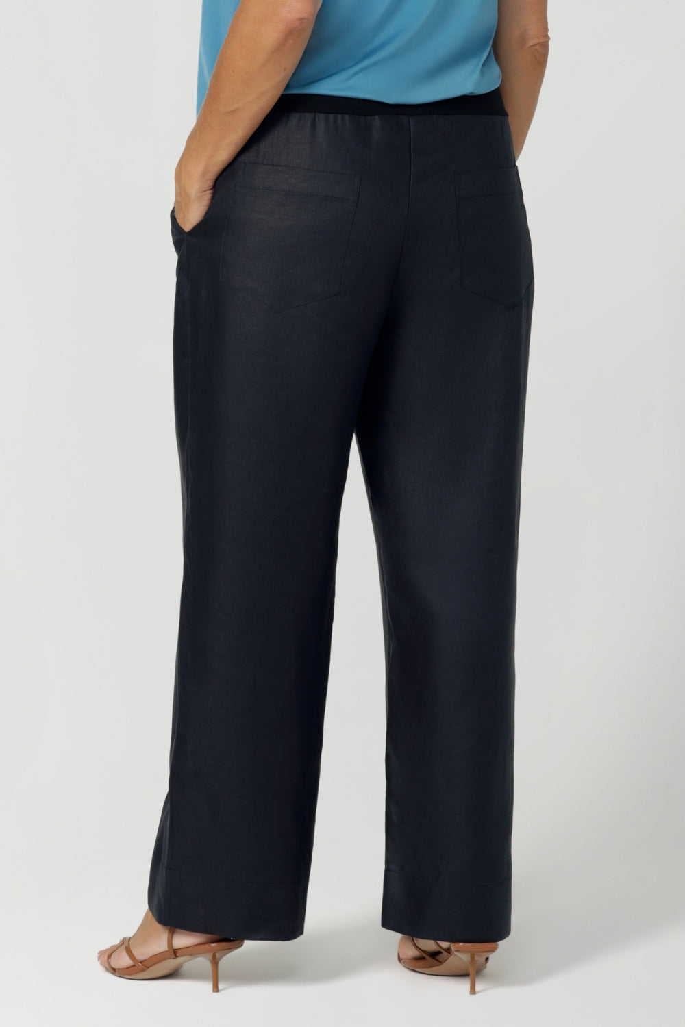 Size 12 woman wears pull on pant style which offers a relaxed yet flattering fit. The waistband crafted from stretch bamboo jersey provides extra flexibility and comfort throughout the day for a woman on the go. Leina & Fleur stock these pants in sizes 8-24