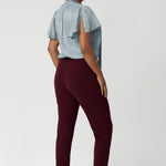 The tapered legs give the pants a modern, flattering silhouette, and the ankle-length design offers a chic, versatile look. Available in sizes 8-24 and in different colours and styles.