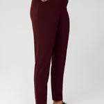 Women's workwear pants are tailored with angled front pockets for practicality, while the back darts enhance the shape and structure. Made from easy care and stretchy scuba crepe fabric in sizes 8-24.