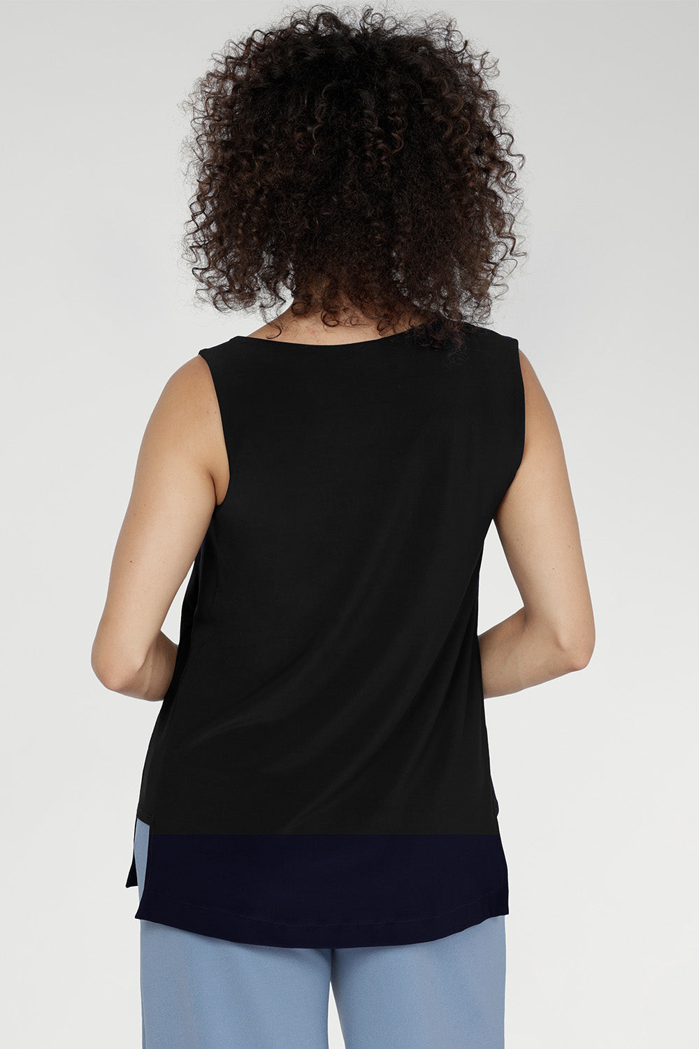 Side panel detailing refines the silhouette, with an optional belt for adjustable styling. Made in Australia.