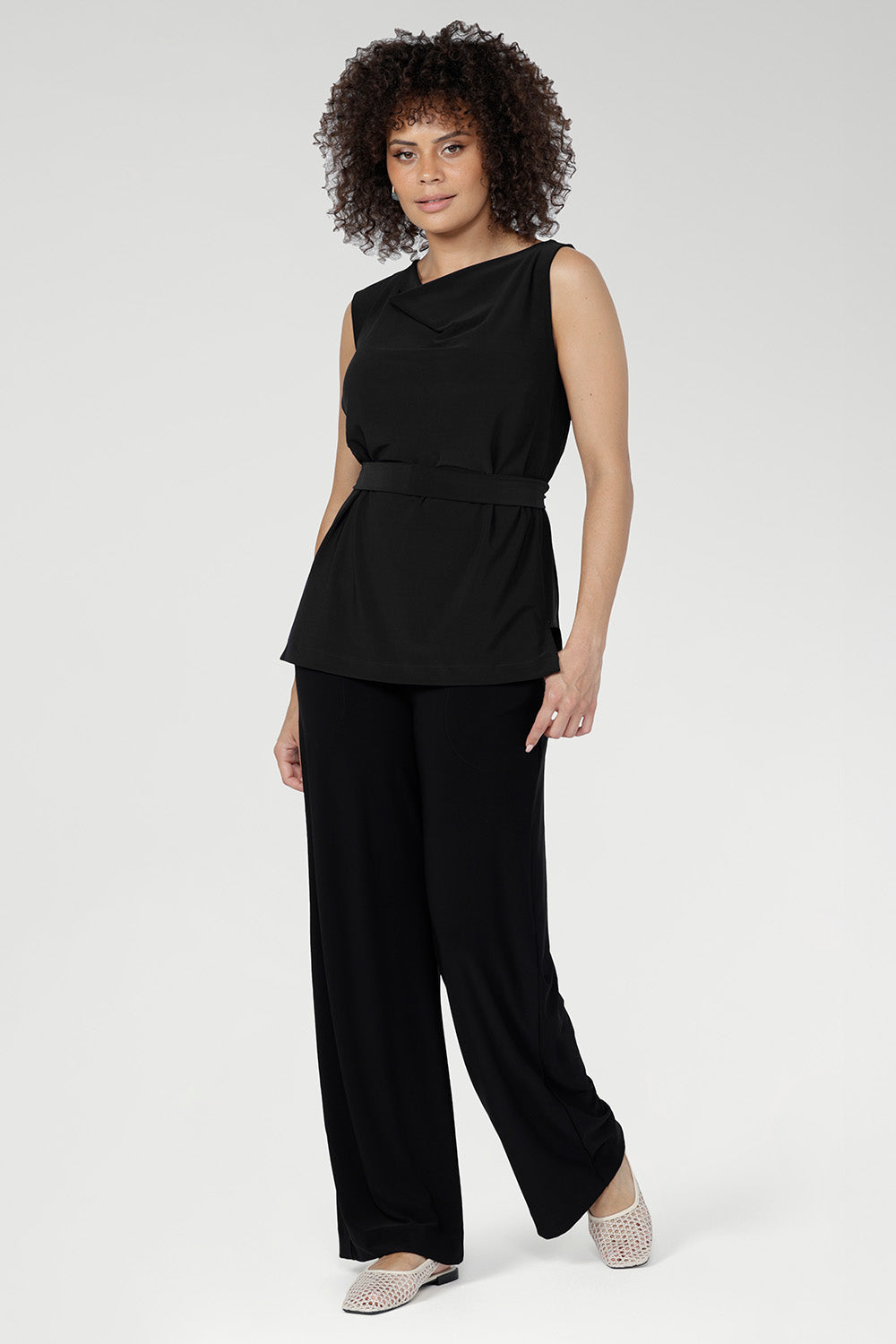 Crafted from soft dry-touch jersey with gentle stretch, the Cory Tunic Top is a sleek sleeveless style for effortless versatility.