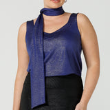 A shimmering jersey neck tie in cobalt puts the finishing touch to matching cami top for an evening event look. Made in Australia by women's clothing and occasionwear brand, L&F.
