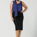 A shimmering jersey neck tie in cobalt puts the finishing touch to matching cami top for an evening event look. Made in Australia by women's clothing and occasionwear brand, L&F.