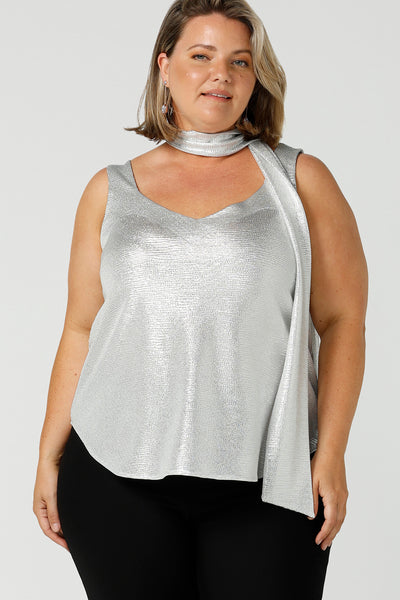 A shimmering jersey neck tie in sterling silver puts the finishing touch to matching cami top for an evening event look. Made in Australia by women's clothing and occasionwear brand, L&F.