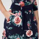 Designed and made in Australia, it’s the essential finishing touch for those seeking elevated, functional fashion that fits and flatters all day long. Navy D-Ring belt seen over Bettina Reversible Dress tying in the colours and print. 