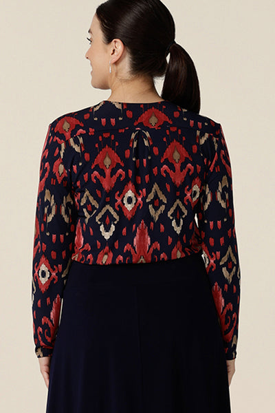 Back view of a great workwear top for women, the Dakota Top in Ikat is a V-neck, long sleeve top in soft stretch jersey. Shown here in a size 10, this top is made in Australia in sizes 8 to 24, petite to plus sizes..