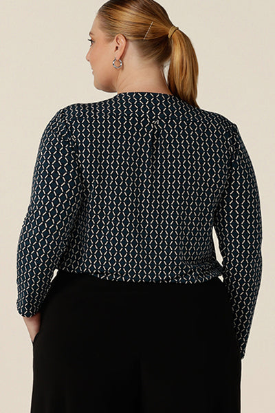 Back view of a good work wear top for plus size women, the long sleeved Dakota Top is a V neck top in blue and white Infinity print jersey. Made in Australia by Australian and New Zealand women's clothes brand, L&F, shop this smart top in sizes 8 to 24.