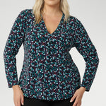 The Dakota jersey collection is a celebration of comfort, colour, and easy elegance, designed for everyday wear and perfect for layering through the cooler seasons. With a relaxed yet refined shape, each piece in the collection is cut from soft jersey fabric that moves with you, offering effortless style from morning to evening. In the vibrant Peacock print, this range comes alive with rich, eye-catching hues of blue, mint, and berry—bringing energy and warmth to grey winter days.