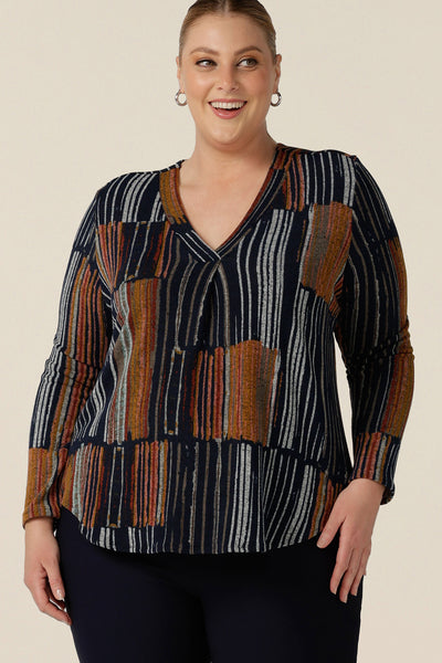 A casual top for plus size women, this is a V-neck top with long sleeves and shirttail hem. In a fine knit jersey fabric, this non-iron top is made in Australia by women's clothes brand, Leina & Fleur. Shop tops online in sizes 8 to 24.