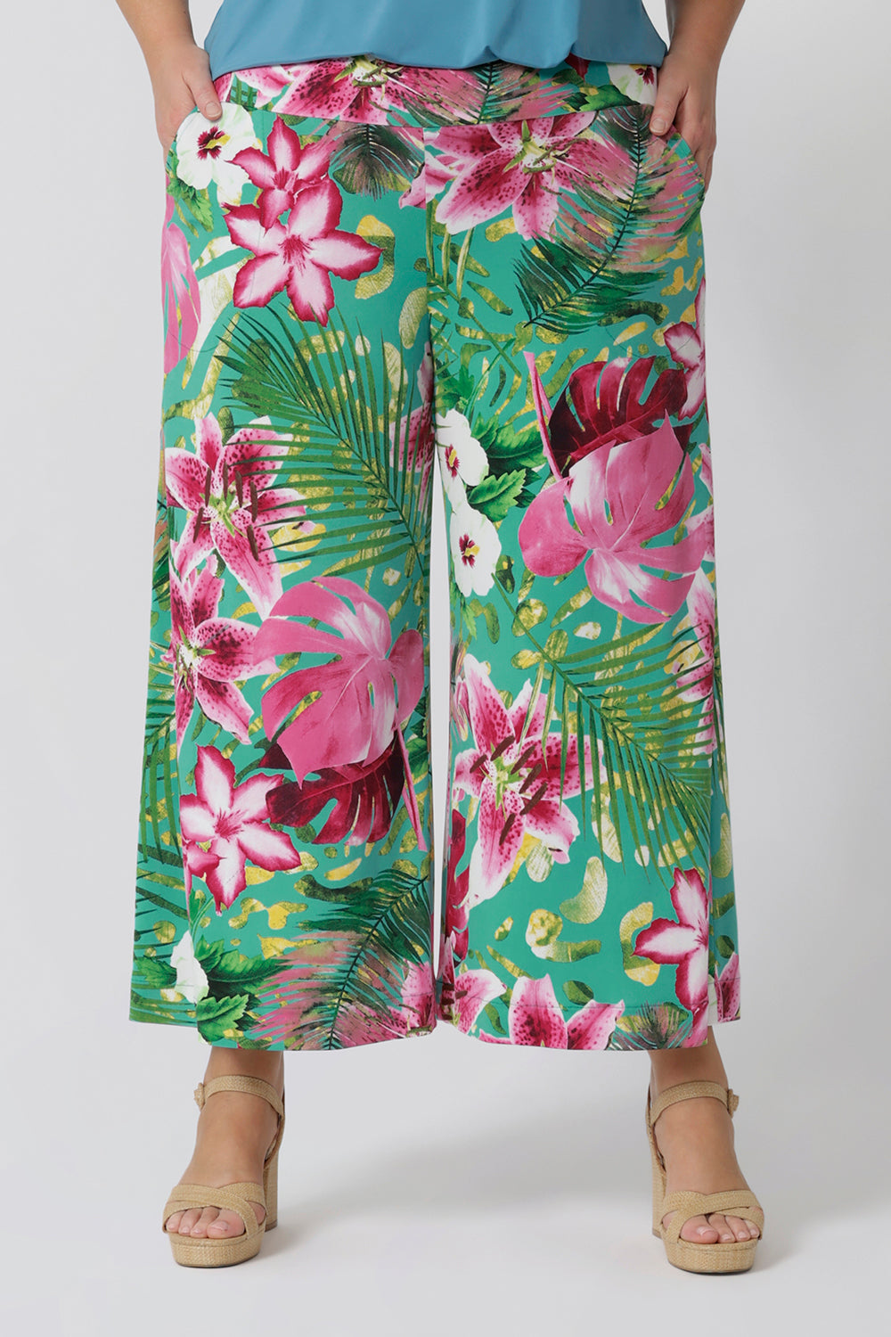 Close up image of pull-on style floral culottes that provide a soft, fluid drape that moves with you. Ideal for travel or busy days filled with events with their wrinkle-resistant feature, making them a must-have for a chic, resort-ready look. Made in Australia, they combine quality craftsmanship with laid-back sophistication, perfect for sunny days and summer celebrations. Sizes 8-24 available. 