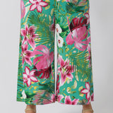 Close up image of pull-on style floral culottes that provide a soft, fluid drape that moves with you. Ideal for travel or busy days filled with events with their wrinkle-resistant feature, making them a must-have for a chic, resort-ready look. Made in Australia, they combine quality craftsmanship with laid-back sophistication, perfect for sunny days and summer celebrations. Sizes 8-24 available. 