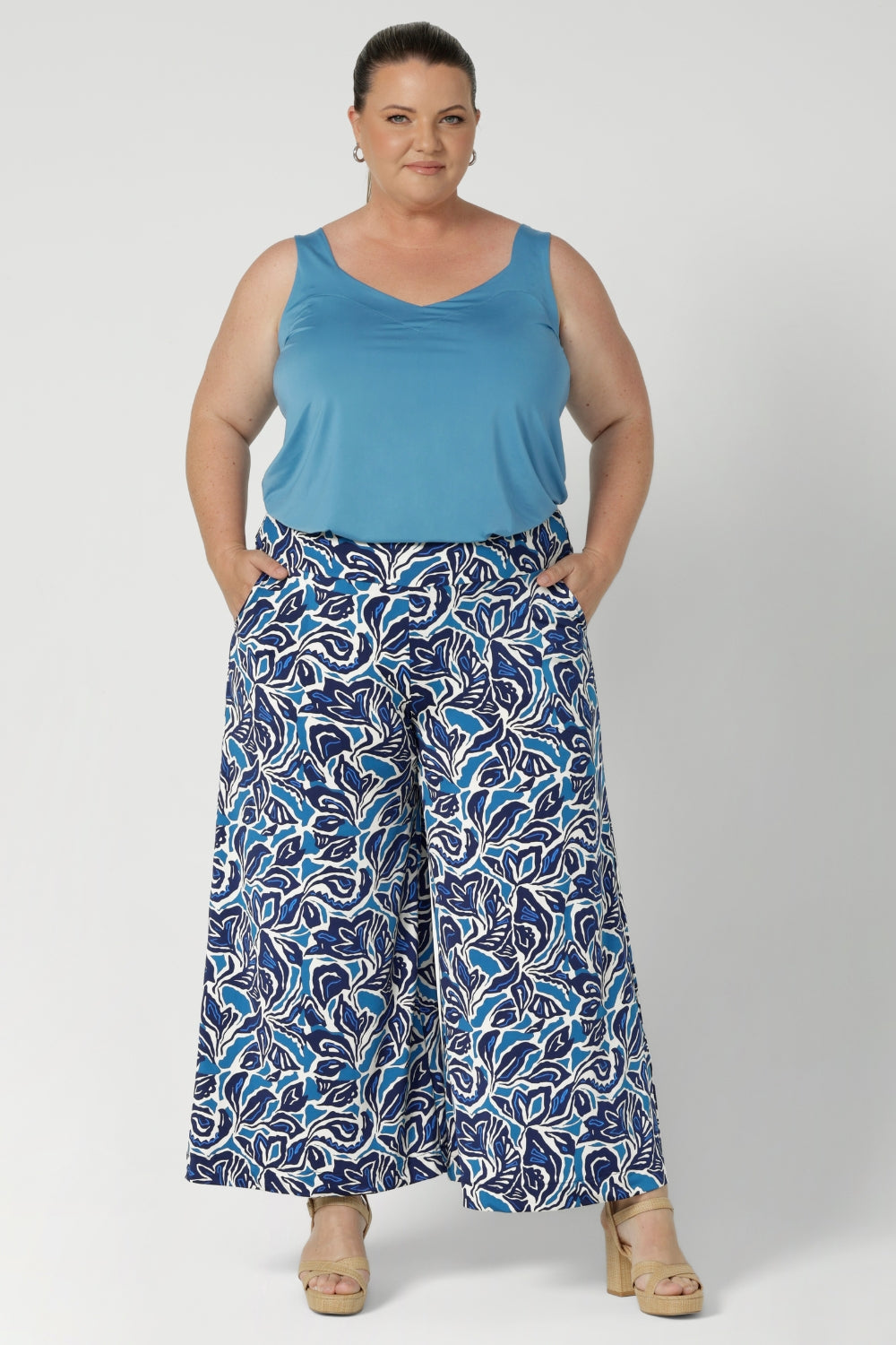 The Blue Hana print in shades of blue and white creates a striking yet subtle pattern, adding depth and texture to the design while remaining easy to style with a variety of tops or jackets. Australian-made and available in sizes 8-24, these pants are designed to fit and flatter a range of body types.