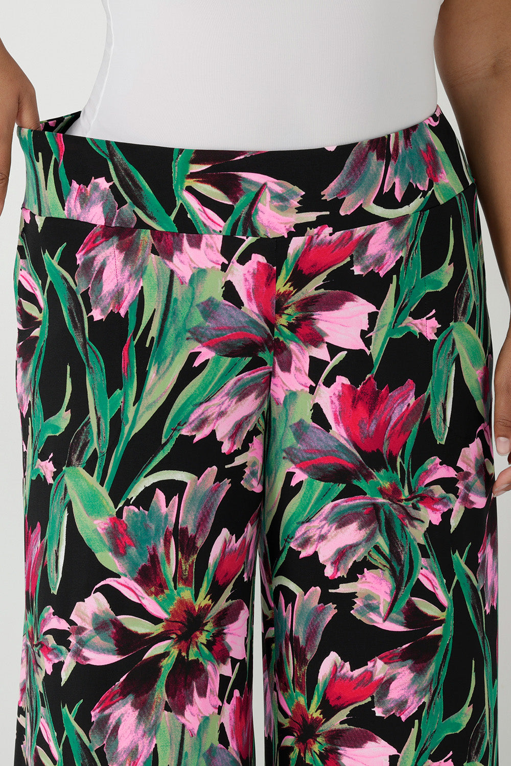 Crop in of the stretch waistband of floral print jersey, wide leg pants by Australian fashion brand, Leina & Fleur.