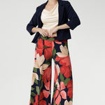 Crafted from our signature dry-touch jersey, the Dany Culotte in Emboldened showcases a bold floral print in red, beige, and green on a deep navy base. 