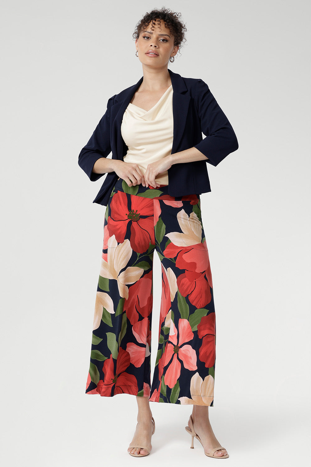 Crafted from our signature dry-touch jersey, the Dany Culotte in Emboldened showcases a bold floral print in red, beige, and green on a deep navy base. 