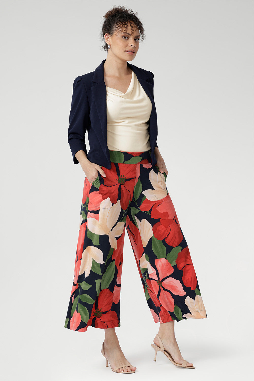 This wide-leg silhouette offers effortless movement and a flattering drape, designed for versatile styling from day to night. 