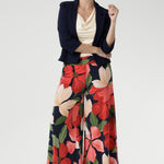 Featuring a pull-on style with a soft yet supportive waistband and functional side pockets for ease and comfort. Perfect for work, evening events, travel, or relaxed weekend wear.