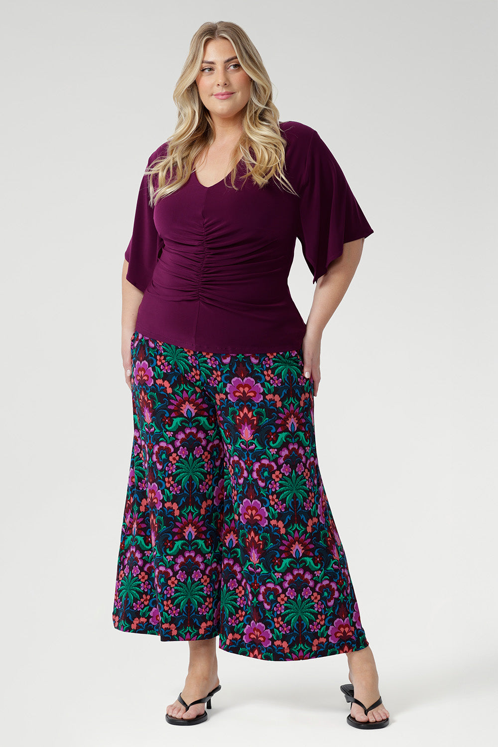 Pull-on, double-layer waistband creates a smooth, comfortable fit, while functional side pockets with visible stitching add a practical, contemporary edge. Crease resistant and easy to care.
