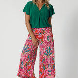 These women's cropped printed pants are the perfect fusion of style and comfort, featuring an eye-catching abstract summer design that adds a playful yet sophisticated touch to your wardrobe. Made from lightweight crepe jersey fabric, they offer a soft, fluid drape that feels cool and comfortable against the skin. The fabric’s gentle stretch and breathable qualities make them ideal for travel, ensuring all-day comfort no matter how long the journey.