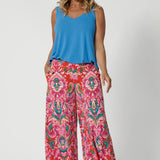 Summer culottes are available in two lengths to suit different heights, shapes and styles. The easy going fit is both modern and laid-back, while the abstract print adds a contemporary flair of summer. Size 12 model pairs her printed culottes with opal coloured cami for a summer day look. Versatile pant can be styled up or down depending on the occasion.