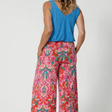 Size 12 woman wears printed culotte. Perfect fusion of style and comfort, featuring an eye-catching abstract summer design that adds a playful yet sophisticated touch to your wardrobe. Made from lightweight crepe jersey fabric, they offer a soft, stretchy feel that is cooling and comfortable against the skin. Summer ready culottes are available in sizes 8-24. 