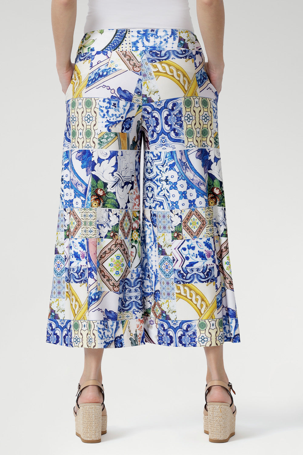 Meet the Dany Culotte in Mosaic Tile — your new go-to wide-leg jersey pant for effortless style and comfort. Crafted from our soft-touch stretch jersey with a silky-smooth feel, this design features a bold mosaic print inspired by Sicilian tilework, blending cobalt, yellow, brown, and green tones over a fresh white base.