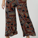 Front view of a size 10 woman wearing the Dany Culotte in Trixie, a printed Jersey work pant with a geometric pattern. Wide leg with functional pockets and wide waistband. Cropped length and petite height friendly. Made in Australia for women size 8 - 24.