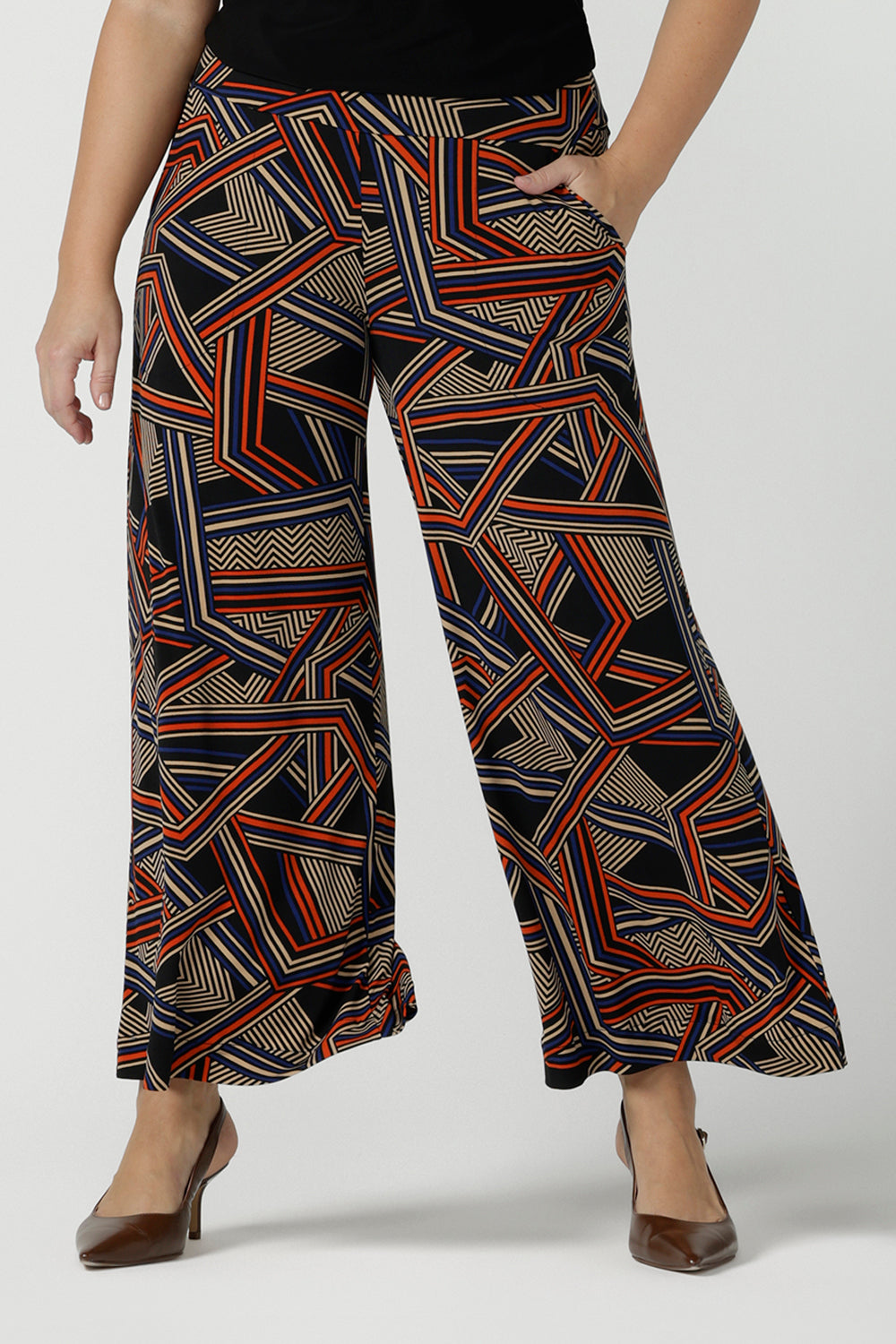 Front view of a size 10 woman wearing the Dany Culotte in Trixie, a printed Jersey work pant with a geometric pattern. Wide leg with functional pockets and wide waistband. Cropped length and petite height friendly. Made in Australia for women size 8 - 24.