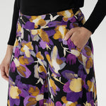 Made from our signature dry-touch jersey fabric with a soft stretch, these beautifully crafted culottes feature a striking painterly-style floral print in rich purples and soft yellow hues that instantly catch the eye.