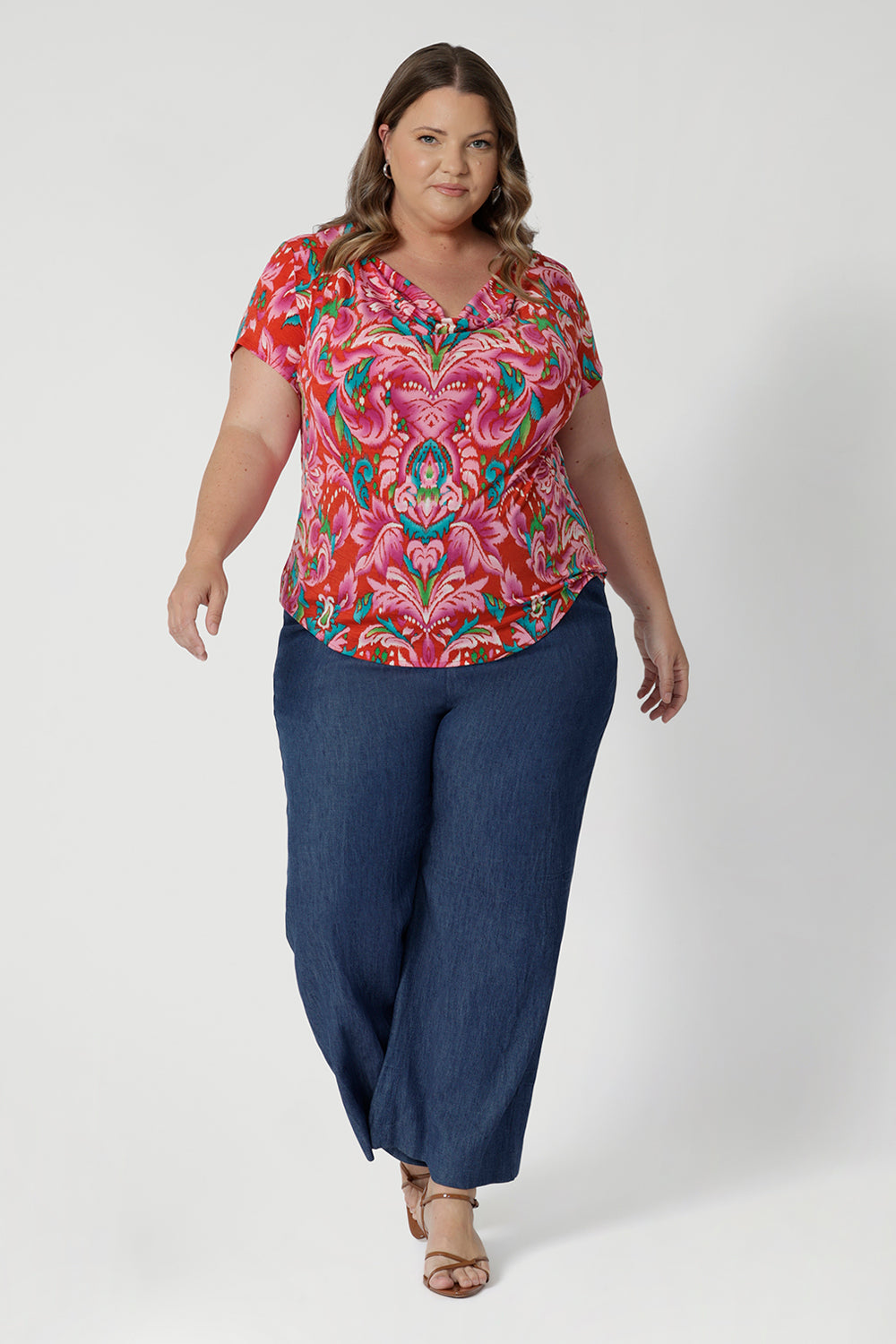 Proudly Australian-made, ideal for warm-weather days. As seen on size 18 woman  This versatile piece combines easy wearability with chic, vacation-ready style - that can be dressed up with white pants & heels or tucked into a pair of denim pants with flat sneakers for a day look.