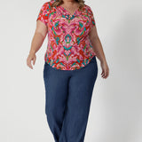 Proudly Australian-made, ideal for warm-weather days. As seen on size 18 woman  This versatile piece combines easy wearability with chic, vacation-ready style - that can be dressed up with white pants & heels or tucked into a pair of denim pants with flat sneakers for a day look.