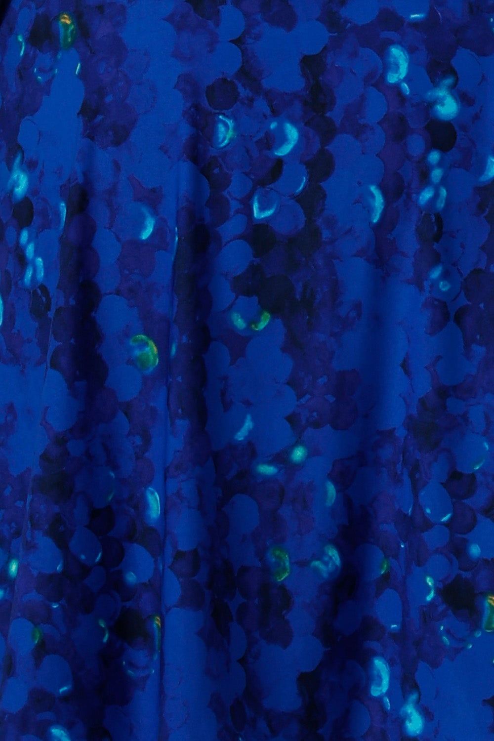 Fabric swatch of L&F Deep Dive fabric. An aqua, navy and green abstract print on a cobalt blue base. This fabric has soft stretch. Made in Australia by women's clothing brand, L&F in sizes 8-24. 