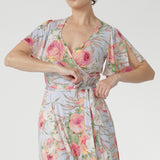 The romantic Powder Bloom print combines delicate shades of pink, peach, and green on a serene powder blue base—making it the perfect choice for weddings, garden parties, or any special occasion.