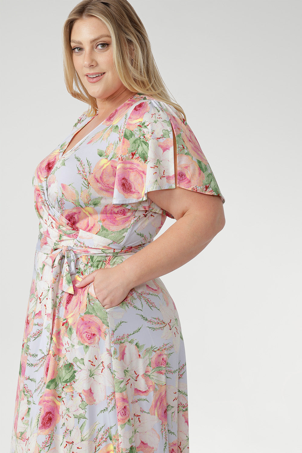 Crafted from our signature slinky jersey, the Delaney Dress in Powder Bloom is a timeless wrap dress that beautifully blends comfort and elegance. Designed to flatter, it drapes effortlessly over the body, offering a soft stretch that moves with you from day to evening.