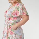 Crafted from our signature slinky jersey, the Delaney Dress in Powder Bloom is a timeless wrap dress that beautifully blends comfort and elegance. Designed to flatter, it drapes effortlessly over the body, offering a soft stretch that moves with you from day to evening.