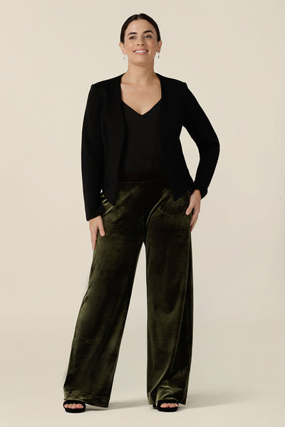 The best cocktail pants, the Deni Pant is worn here with a black cami top and collarless black jacket to give a modern evening suit look. Straight, wide leg pants in green velour, these evening trousers are pull on pants and comfortable in stretch fabric. Shop this occasion and cocktail attire online at Australian fashion brand, Leina & Fleur.