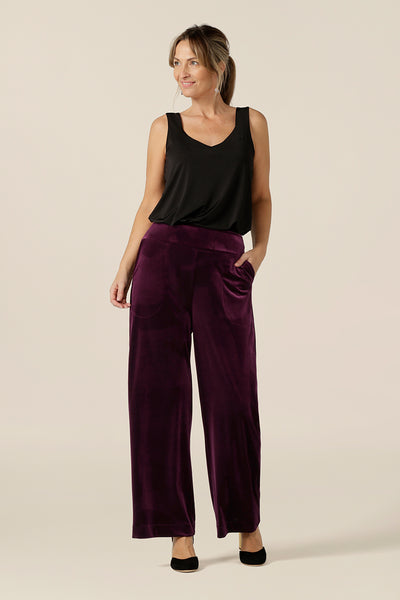 Slinky eveningwear pants make a good alternative for cocktail dress and occasionwear. Made in Australia by Australian and New Zealand women's clothing label, L&F, these straight-cut, wide leg pants in stretchy velour  wear well with formal jackets or black cami tops, as shown here.