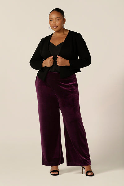 Slinky eveningwear pants make a good alternative for cocktail dress and occasionwear. Made in Australia by Australian and New Zealand women's clothing label, L&F, these straight-cut, wide leg pants in stretchy velour wear well with formal jackets or black cami tops, as shown here.