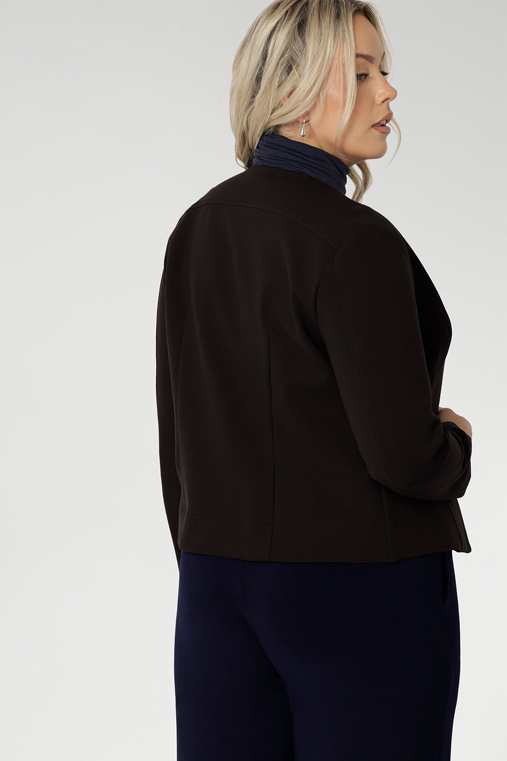 The rich cocoa tone adds a sophisticated, earthy elegance that pairs beautifully with both neutral and bold pieces, making it a versatile choice for work, travel, and everyday wear.