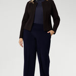 Designed with a sleek, collarless silhouette, the Drake Jacket features a round neckline and an open-front design for easy layering. Double-layered front panels provide a tailored, refined look, while the single-layer back with shaping darts ensures a flattering fit.