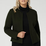 This cropped, collarless jacket features a round neckline and an open-front design, making it a versatile layering essential for the office, weekend outings, or travel.