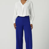 The Drew Pant in Cobalt Scuba Crepe with a wide leg Cobalt pant with a high waist that can be worn with the matching Blazer. Comfortable and easy care suit set for women. Size 8-24. 