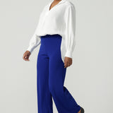 The Drew Pant in Cobalt Scuba Crepe with a wide leg Cobalt pant with a high waist that can be worn with the matching Blazer. Comfortable and easy care suit set for women. Size 8-24.