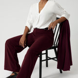 These women’s workwear wide-leg pants in a rich wine colour are made from a luxe, easy-care Scuba Crepe Jersey fabric that features a soft, textured feel and provides full body stretch for maximum comfort and flexibility.