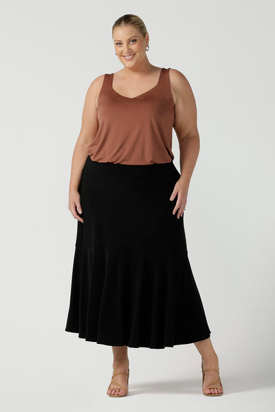 Australian Made Tiered Maxi Skirt in Black Jersey. Comfortable workwear. Pictured on a size 18 curvy woman size inclusive fashion 8-24.