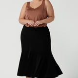 Australian Made Tiered Maxi Skirt in Black Jersey. Beautiful and comfortable workwear. Pictured on a size 18 curvy woman size inclusive fashion 8-24.