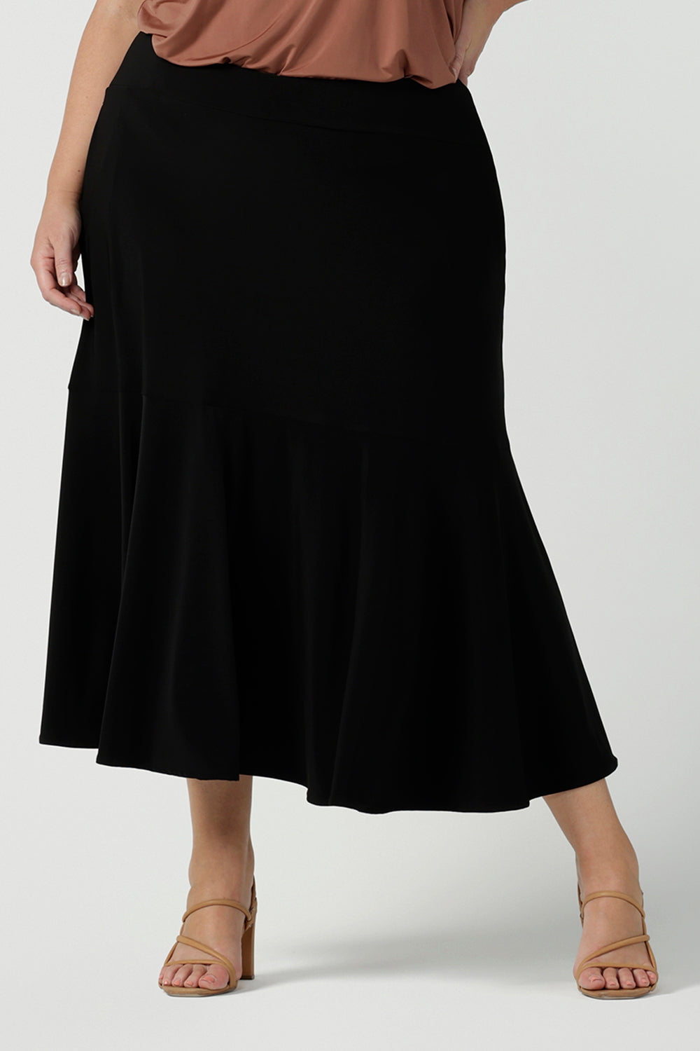 Australian Made Tiered Maxi Skirt in Black Jersey. Beautiful and comfortable workwear. Pictured on a size 18 curvy woman size inclusive fashion 8-24.