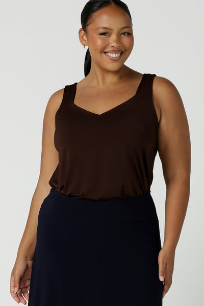 Eddy cami in Cocoa size 16 in a soft jersey fabric. A soft v-neck style that is a great layering piece that takes you from desk to weekend. Style it back with a blazer or pants tucked in. Made in Australia for women size 8 - 24.