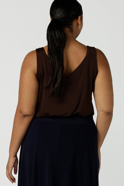 Back view of a Eddy cami in Cocoa size 16 in a soft jersey fabric. A soft v-neck style that is a great layering piece that takes you from desk to weekend. Style it back with a blazer or pants tucked in. Made in Australia for women size 8 - 24.