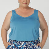 Size 18 woman wears the Eddy Cami top in Mineral is a curve friendly cami top with wide shoulder straps for bra strap coverage. Made in Australia for women size 8 - 24.